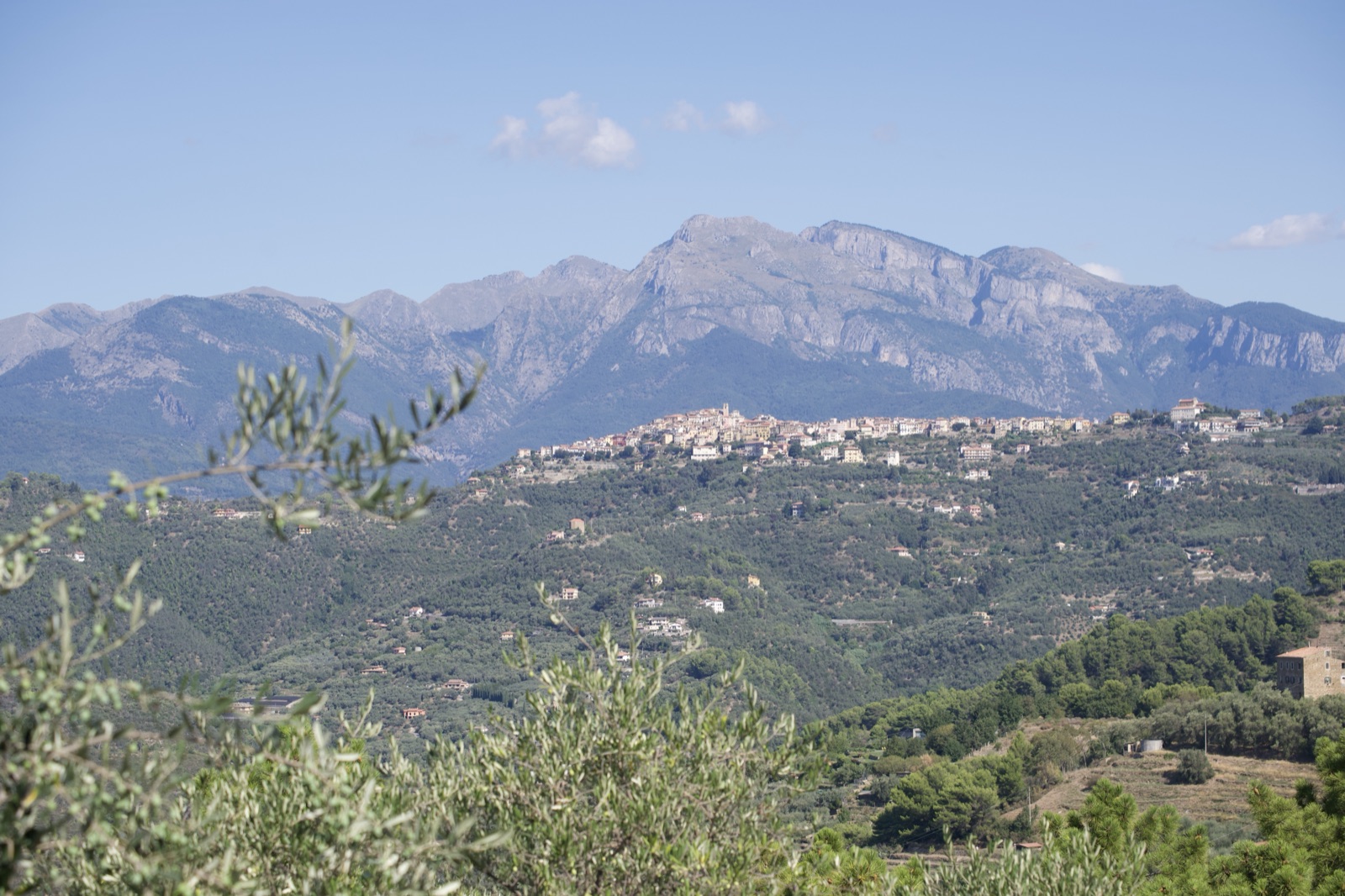 View over the hills to a Ligurian hill town